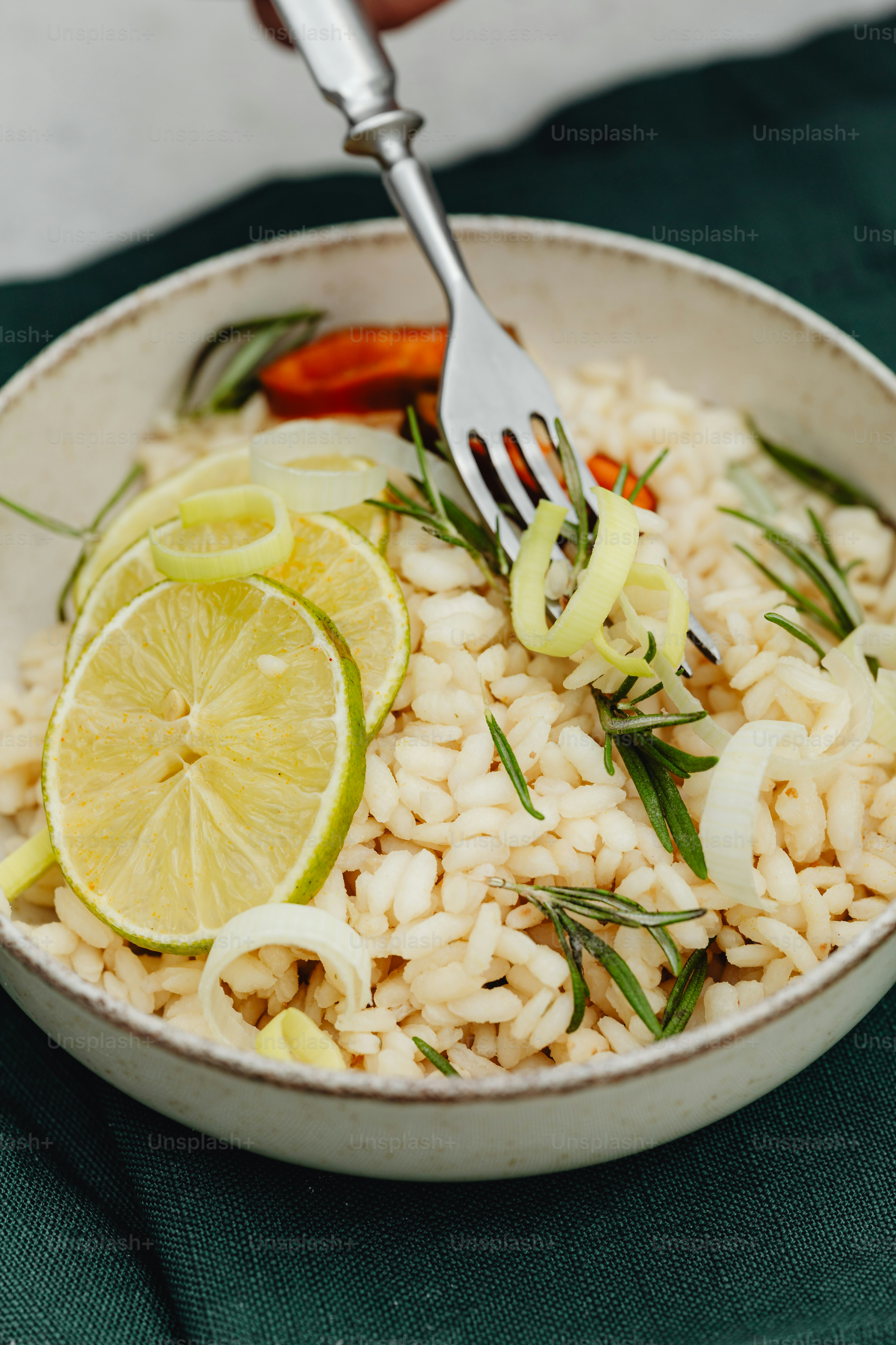 A bowl of rice with a fork in it photo – Food Image on Unsplash