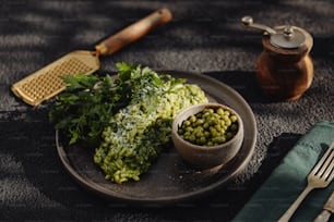 a plate of food with peas and parsley