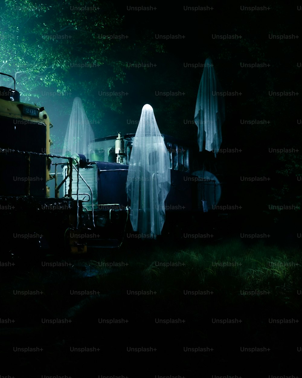 a group of ghostly people standing next to a train