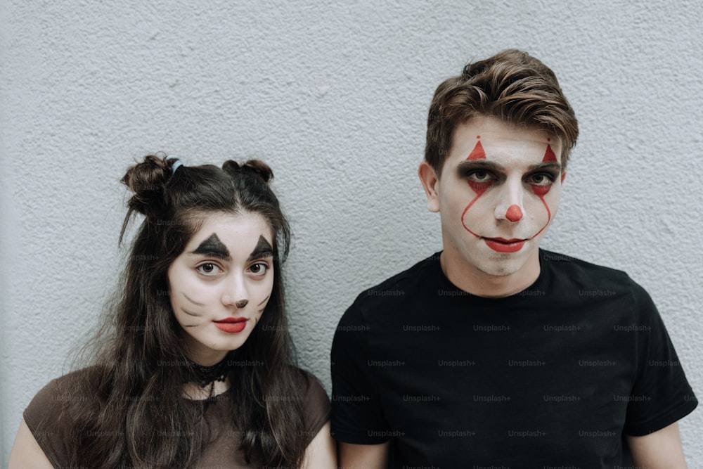 a man and a woman with clown makeup on their faces
