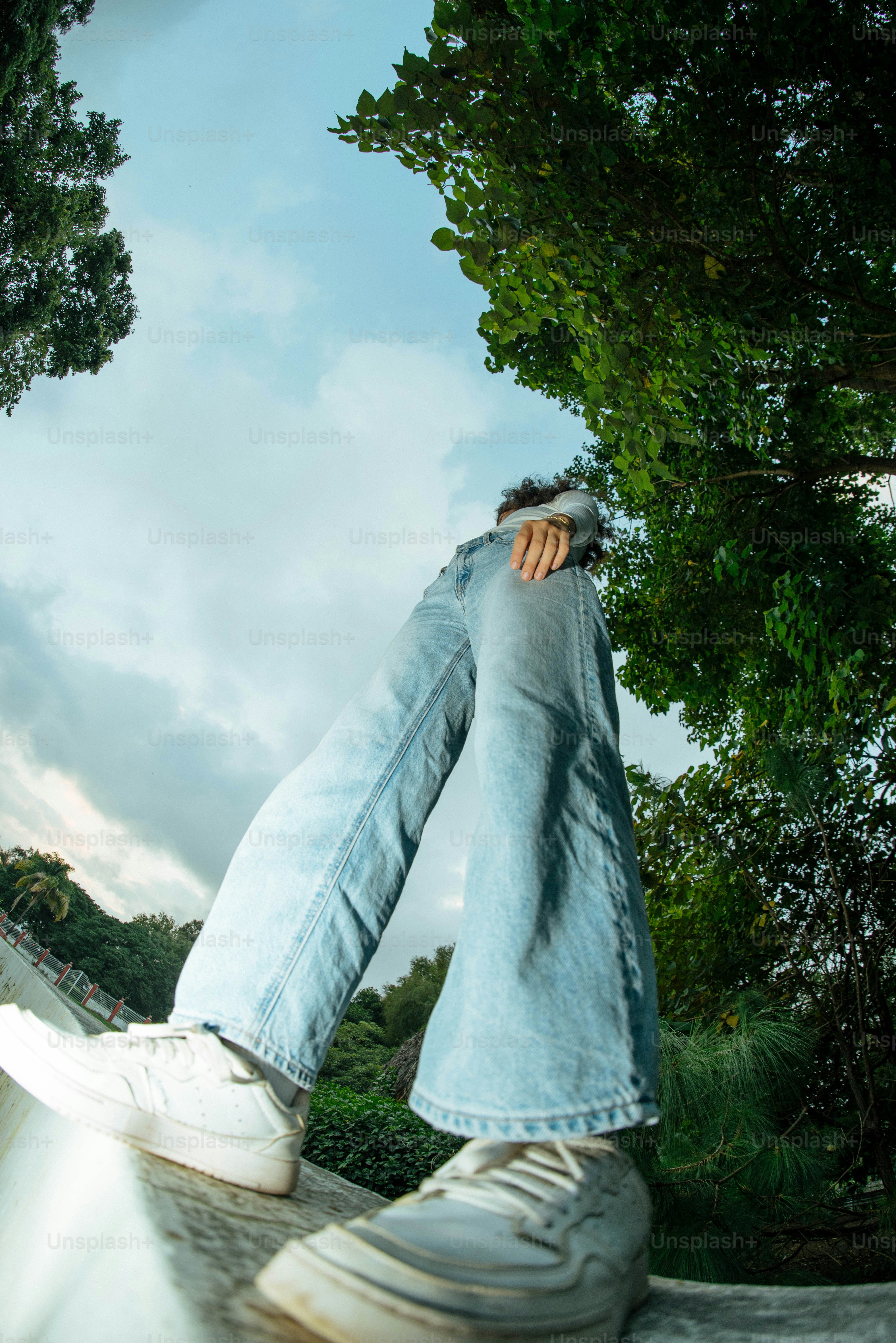 a person with their feet up on a skateboard