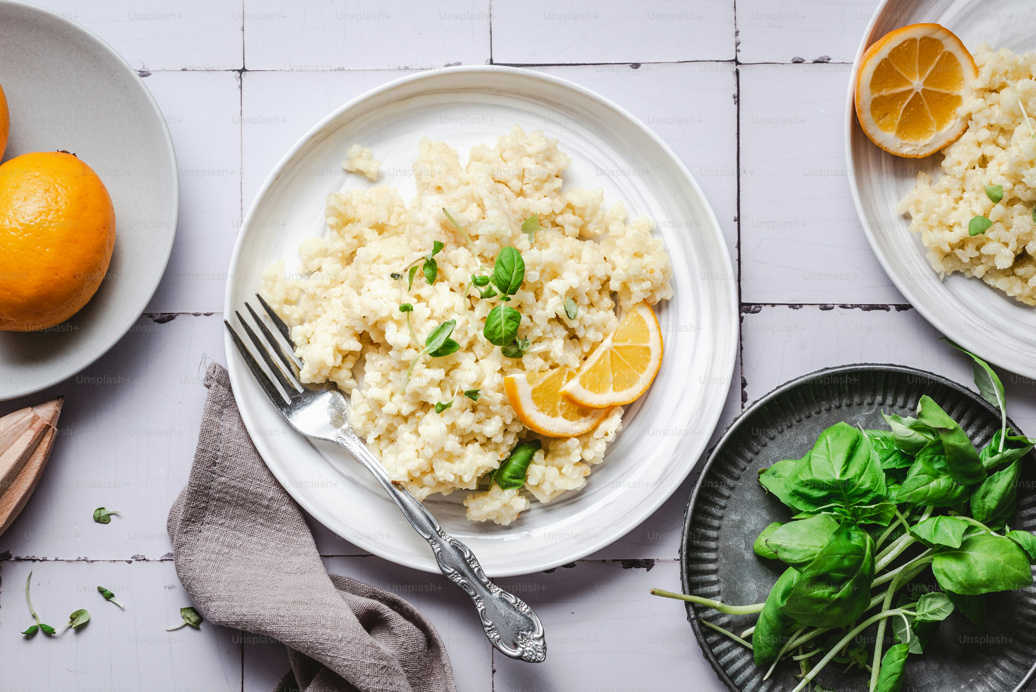 a white plate topped with rice and oranges