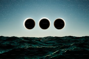three eclipses over a body of water at night