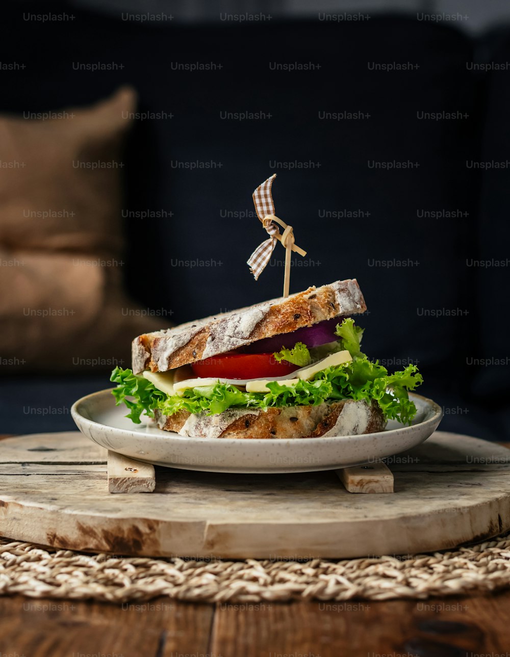 a plate with a sandwich on it on a table