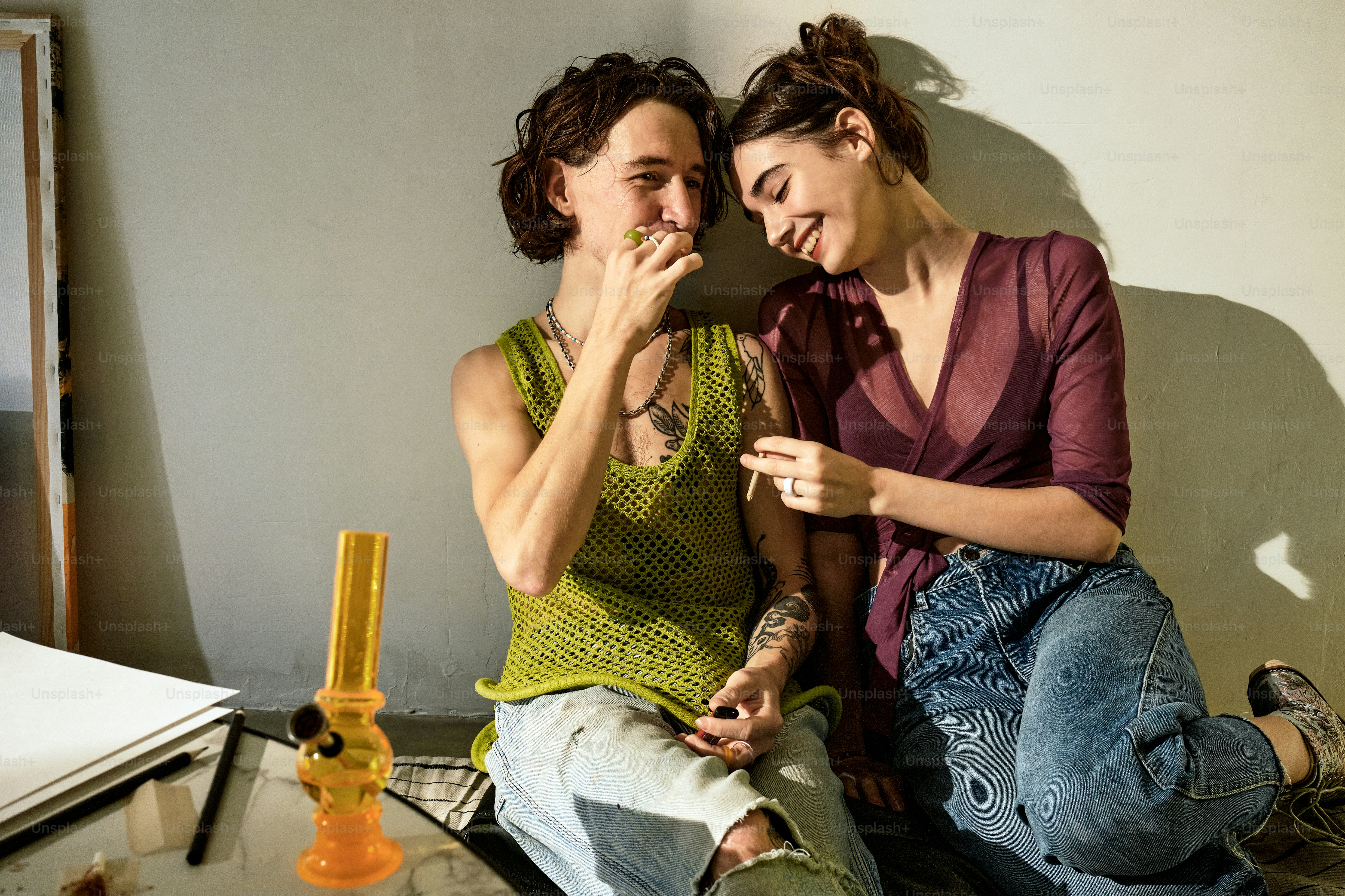 a couple of women sitting next to each other