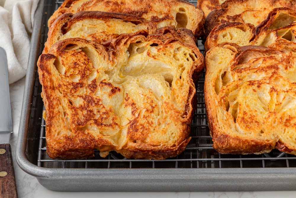 a couple of pieces of bread that are on a rack