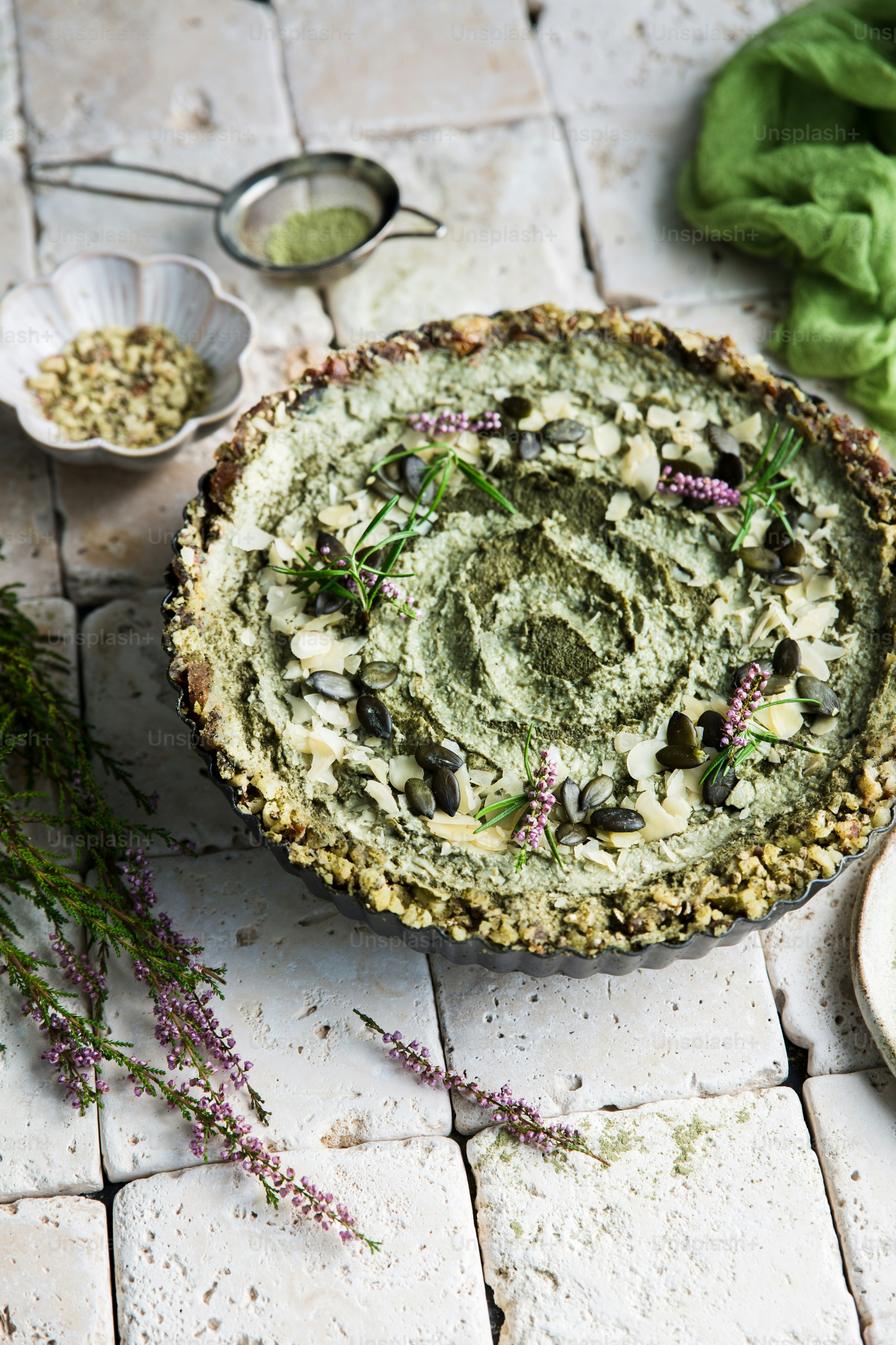 a pie is sitting on a white table