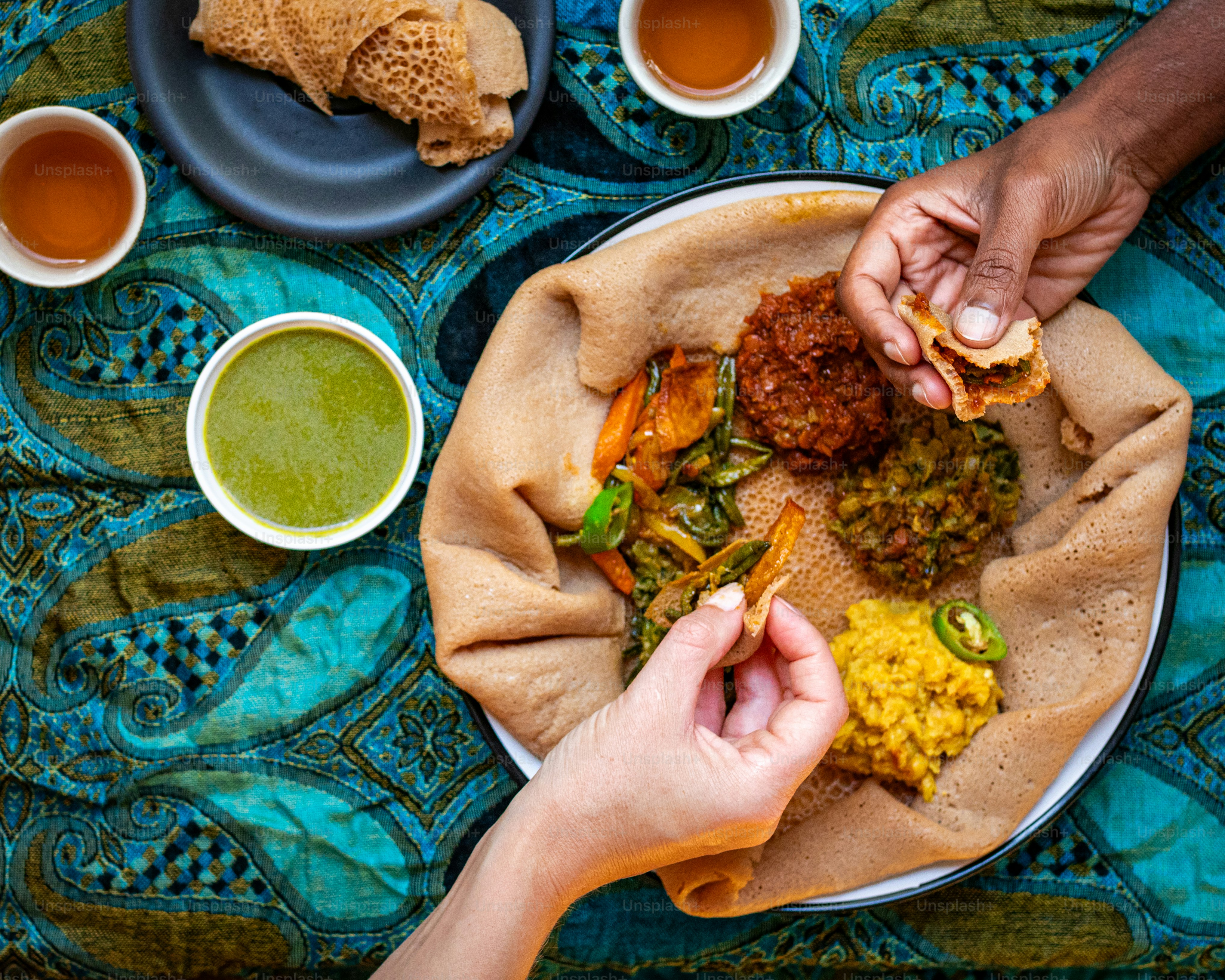 a plate of food on a blue table cloth