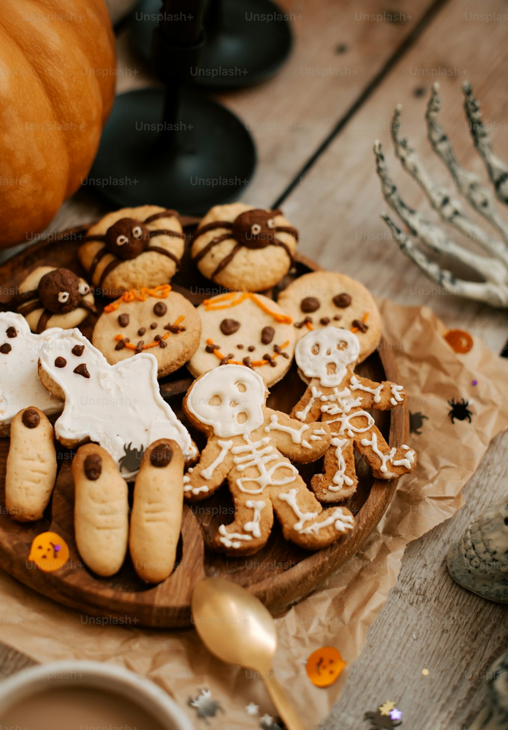 a plate of halloween cookies on a table