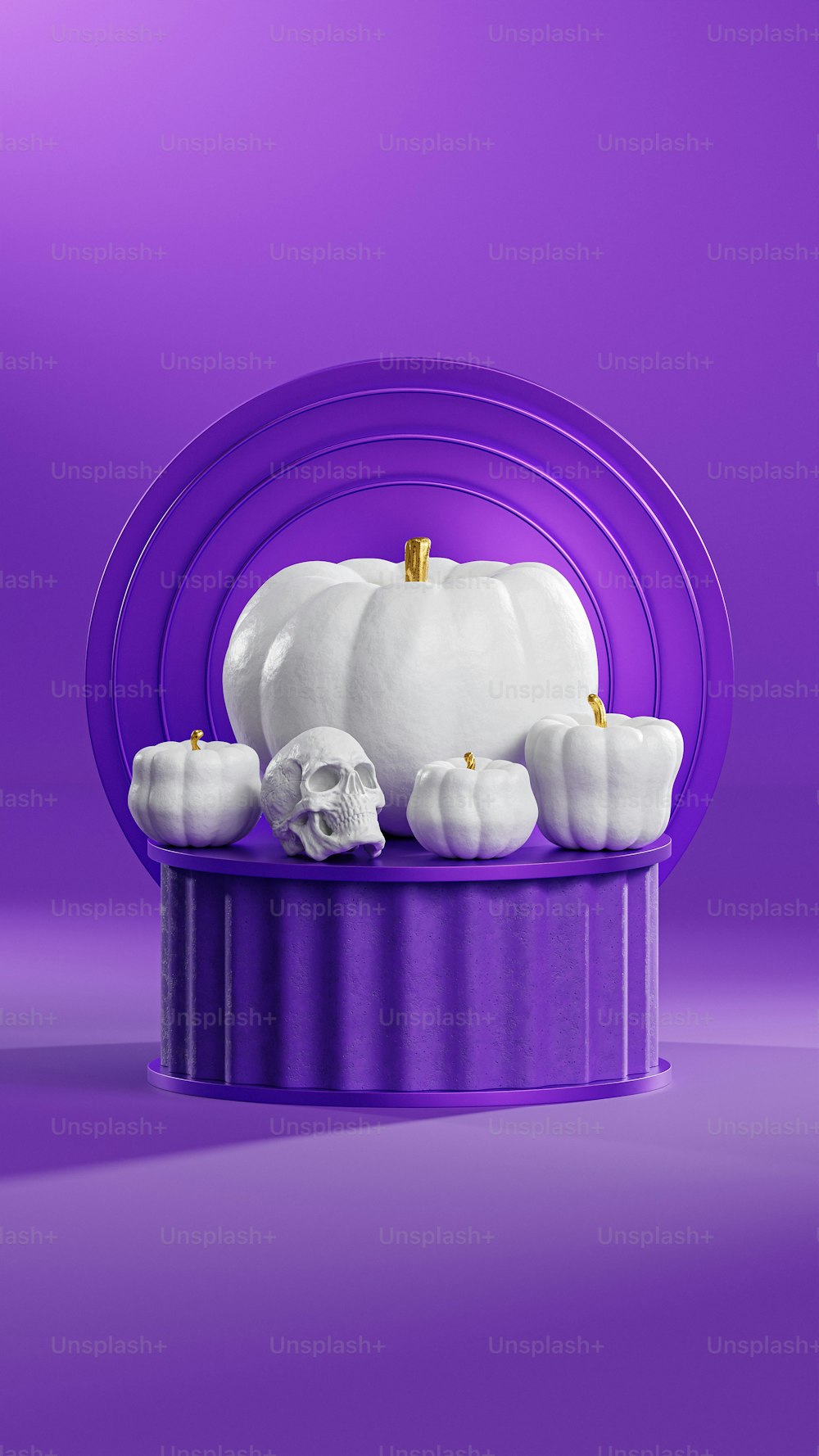 a white pumpkin sitting on top of a purple table