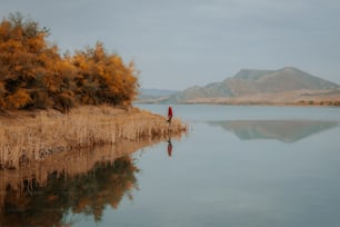 a body of water with a person standing on it