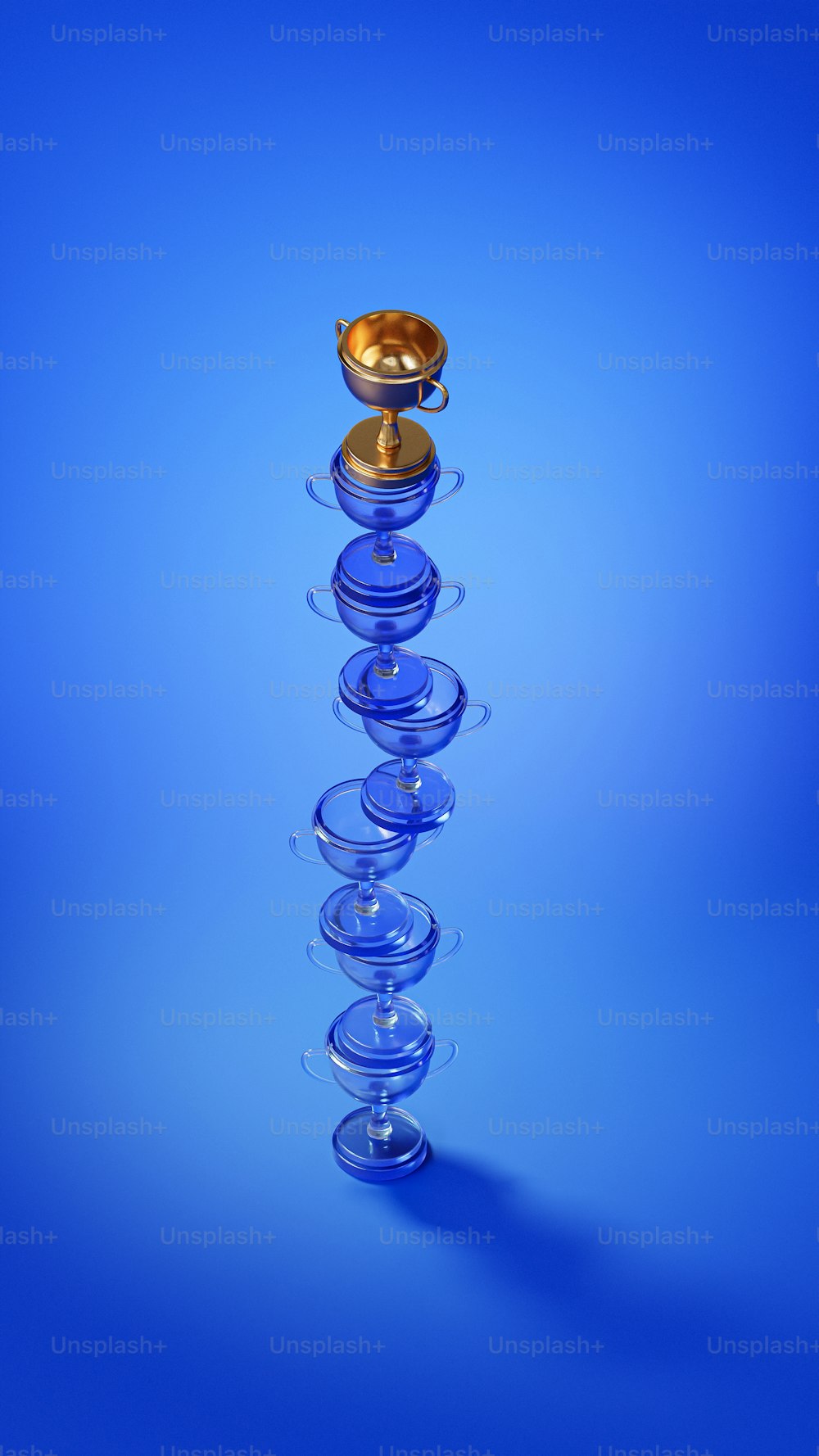 a blue object with a gold object on top of it