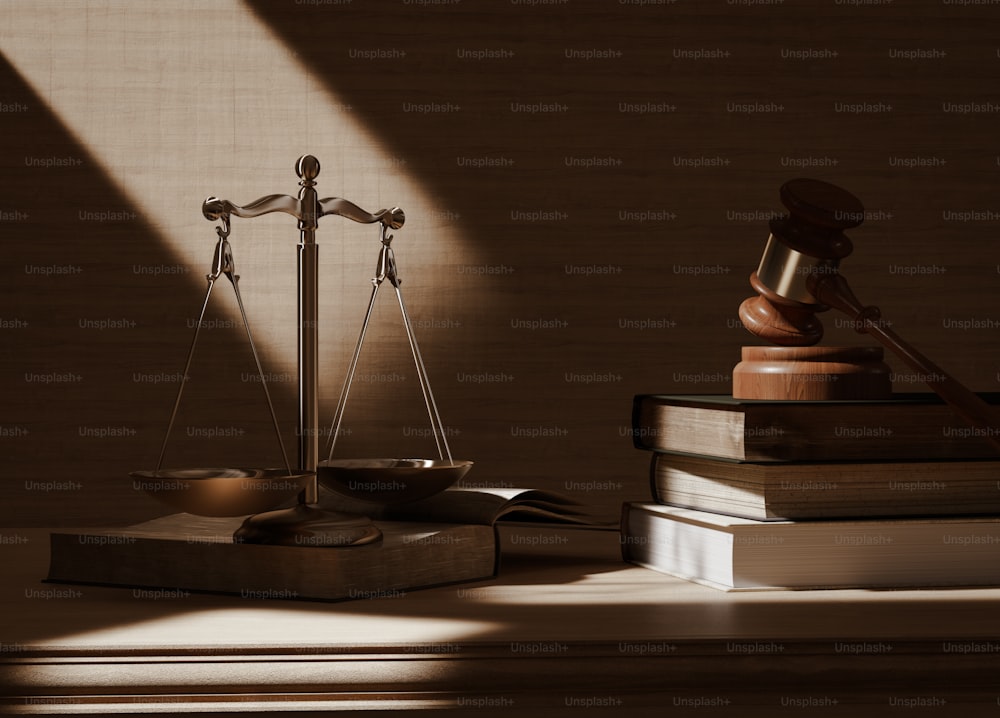 a judge's scale and a book on a table