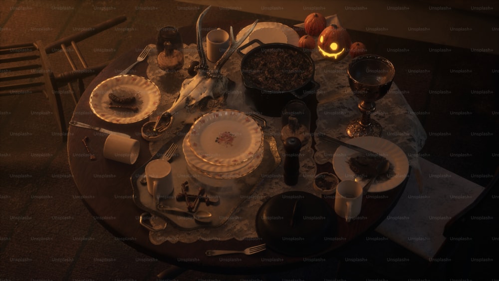 uma mesa posta para uma refeição com pratos e talheres