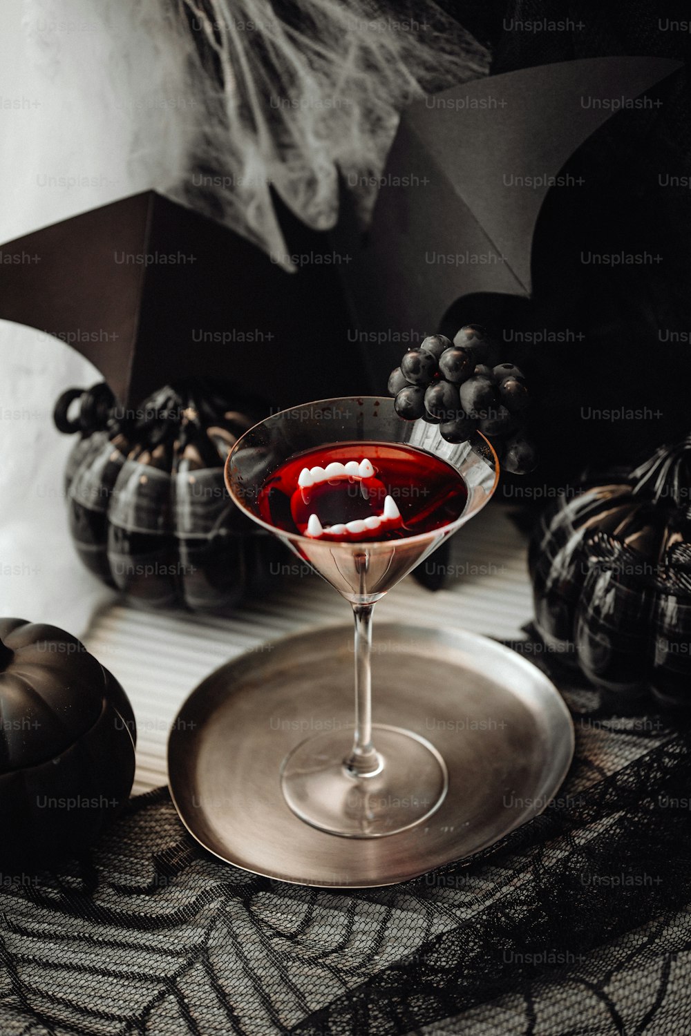 a halloween drink in a martini glass