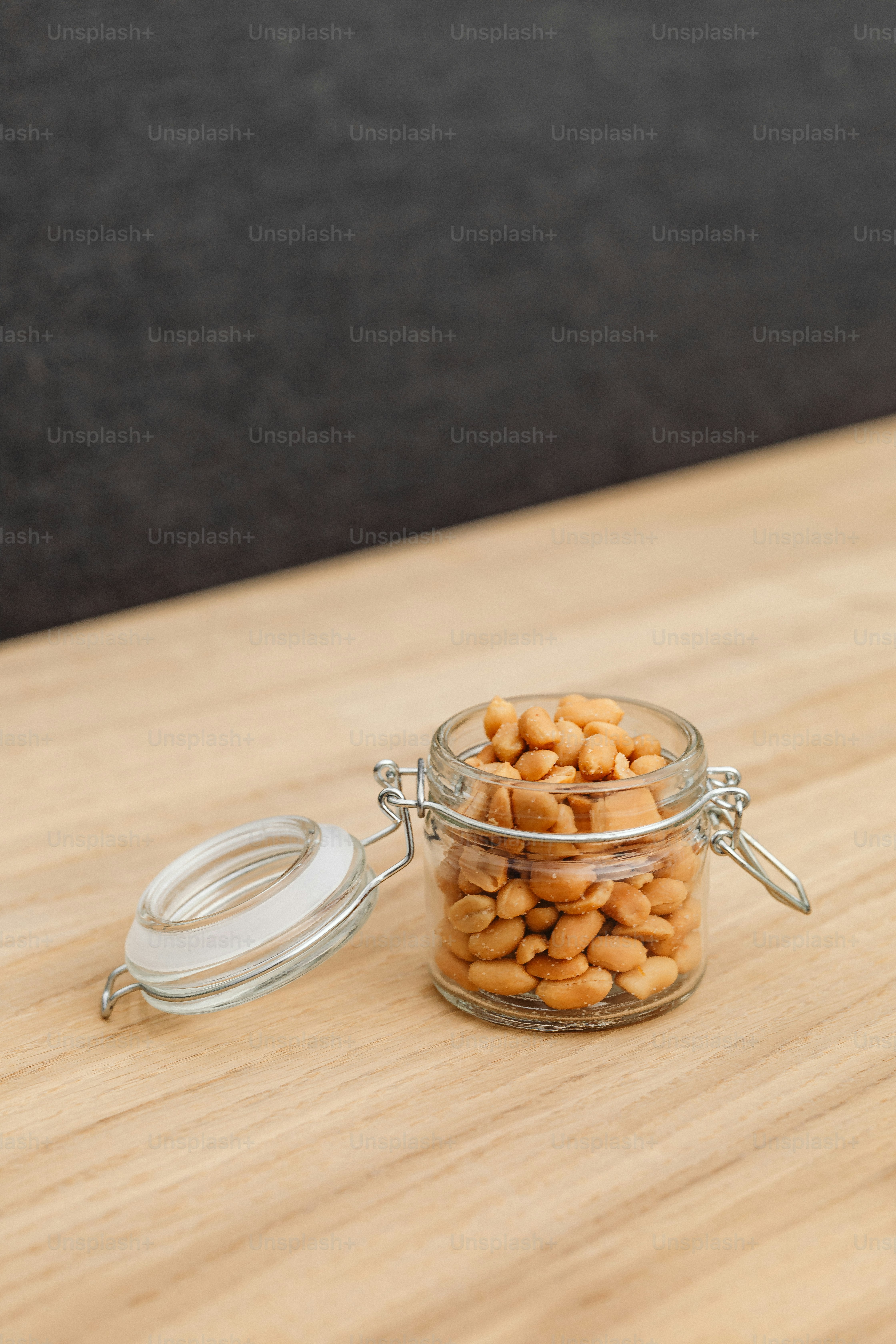 A man sitting at a table with a plate of food photo – Food Image on ...
