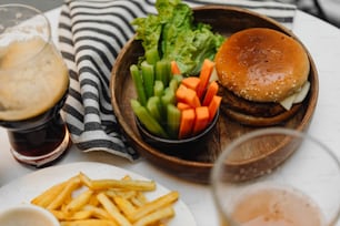 a plate of food with a burger and french fries