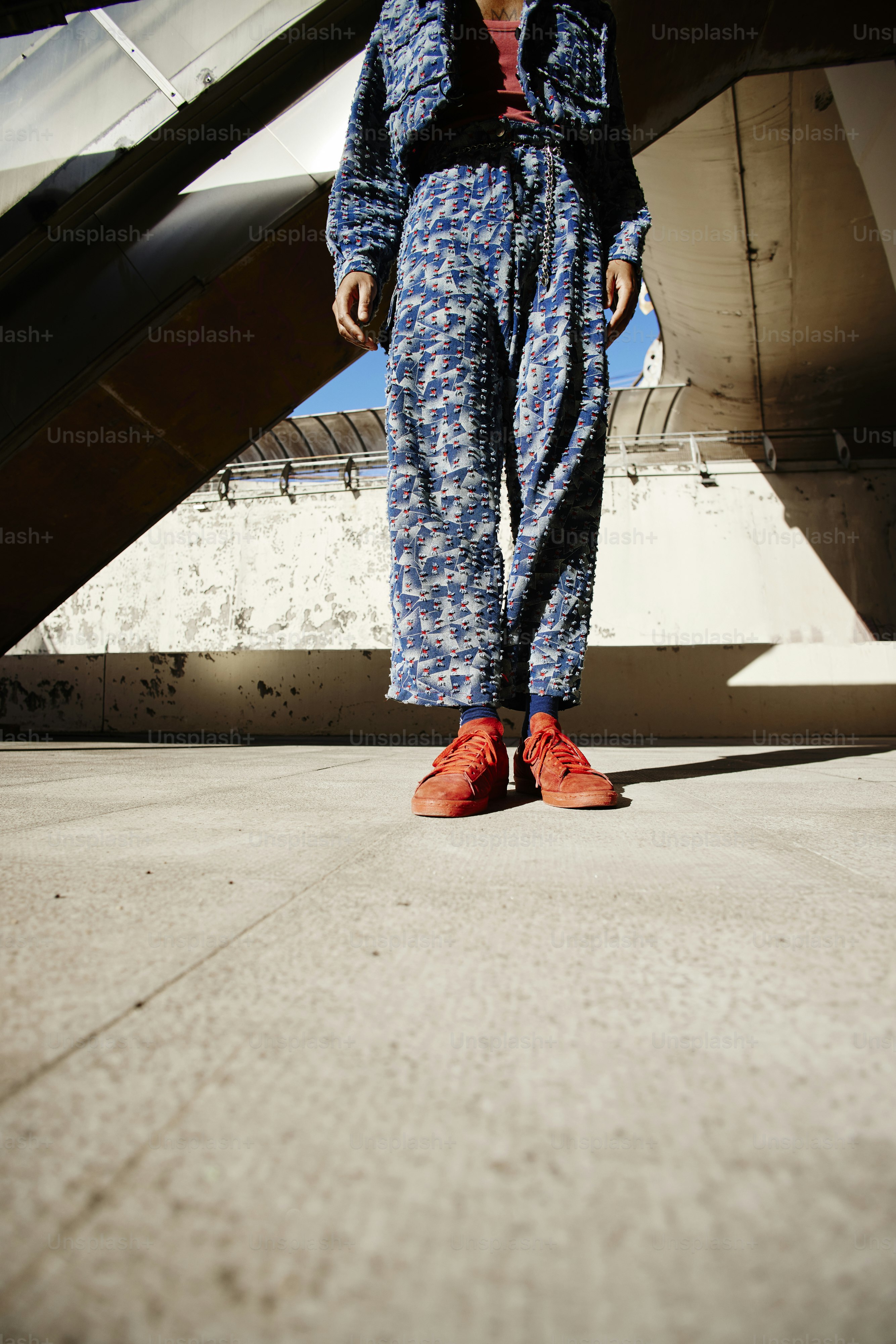 a person standing in front of an airplane