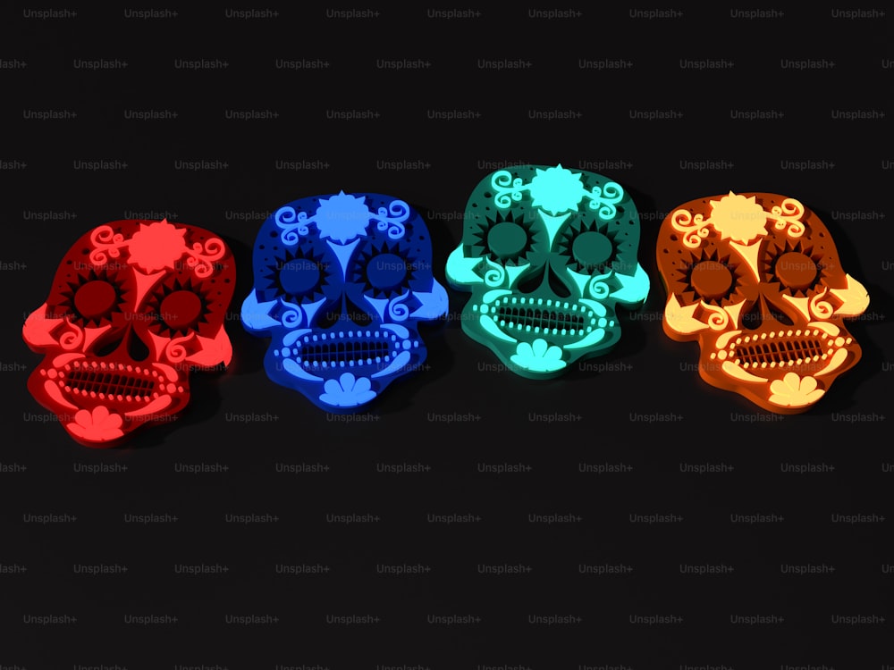 a group of three sugar skulls sitting next to each other