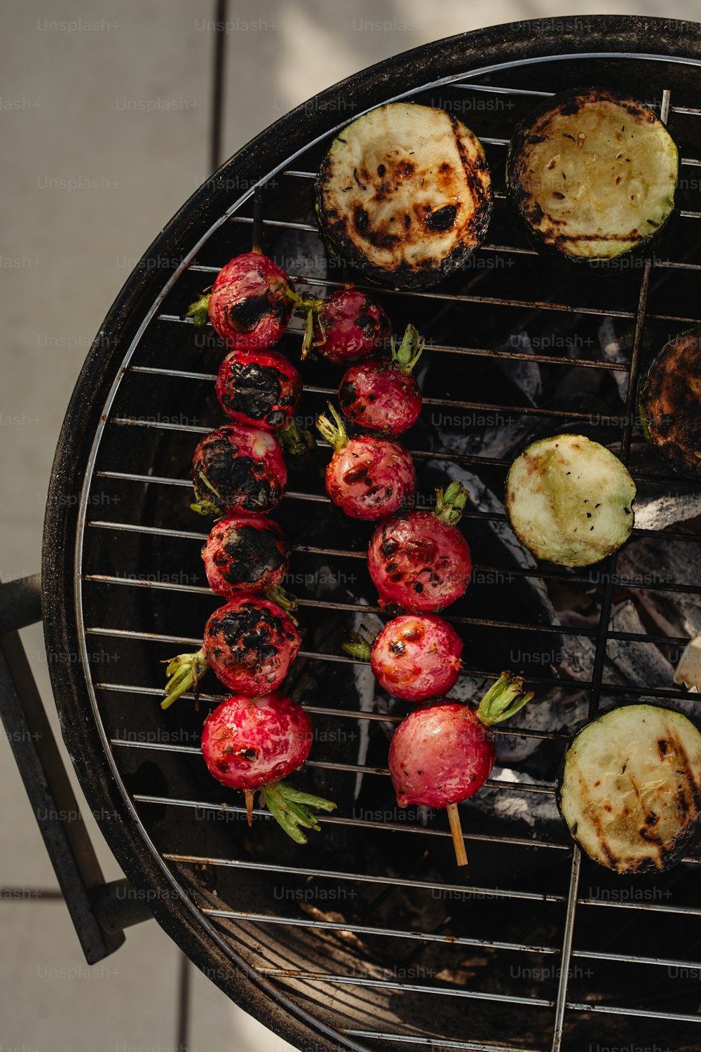 a close up of a grill with food on it