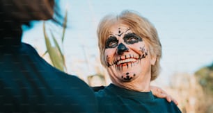 a woman with makeup painted on her face
