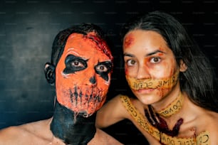 a man and a woman with painted faces