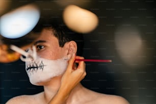 a man with a skull painted on his face