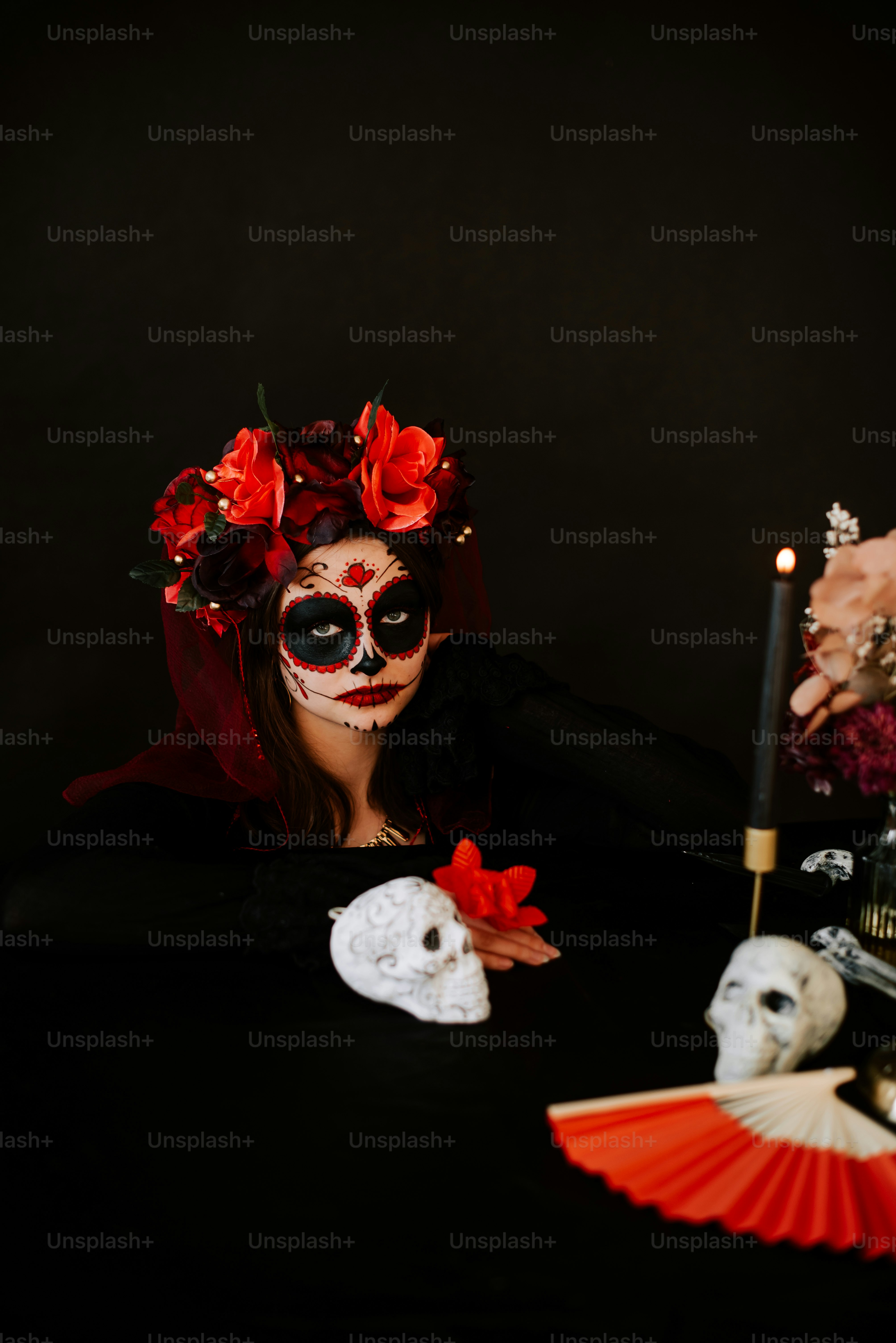 a woman with makeup and makeup art on her face