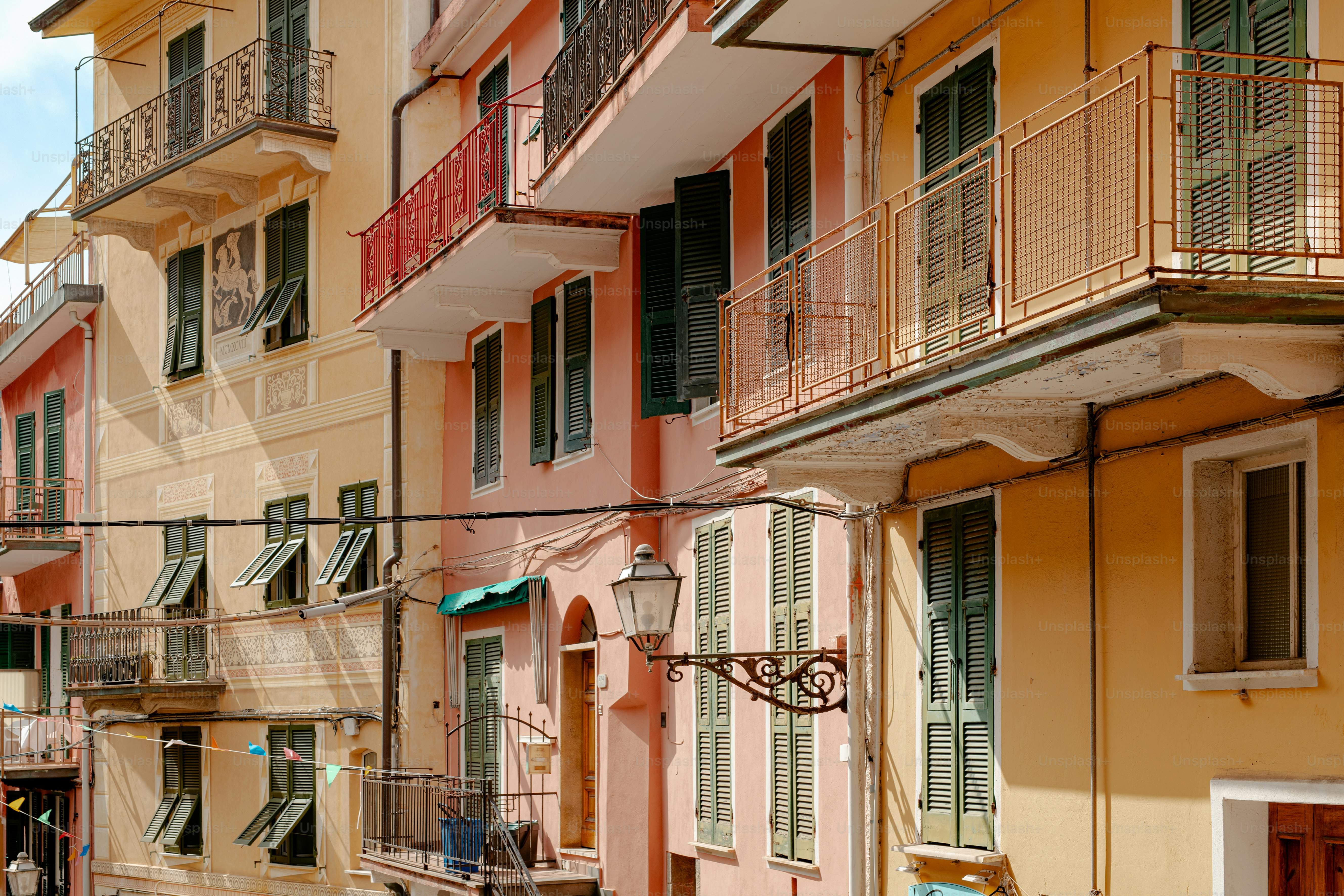 a row of buildings with balconies and balconies on them