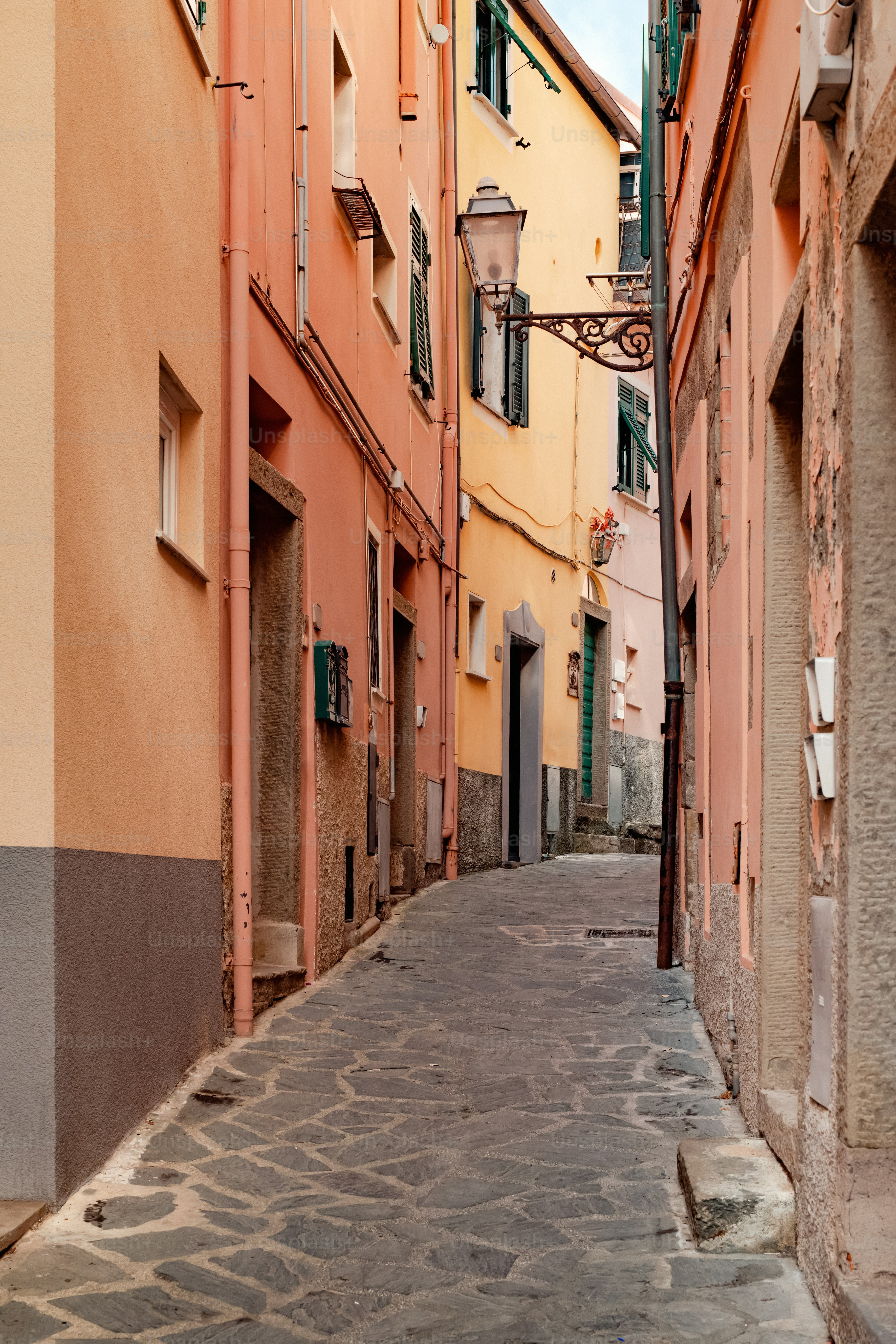 a cobblestone street in an old european city