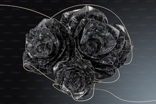 a bunch of black roses sitting on top of a table