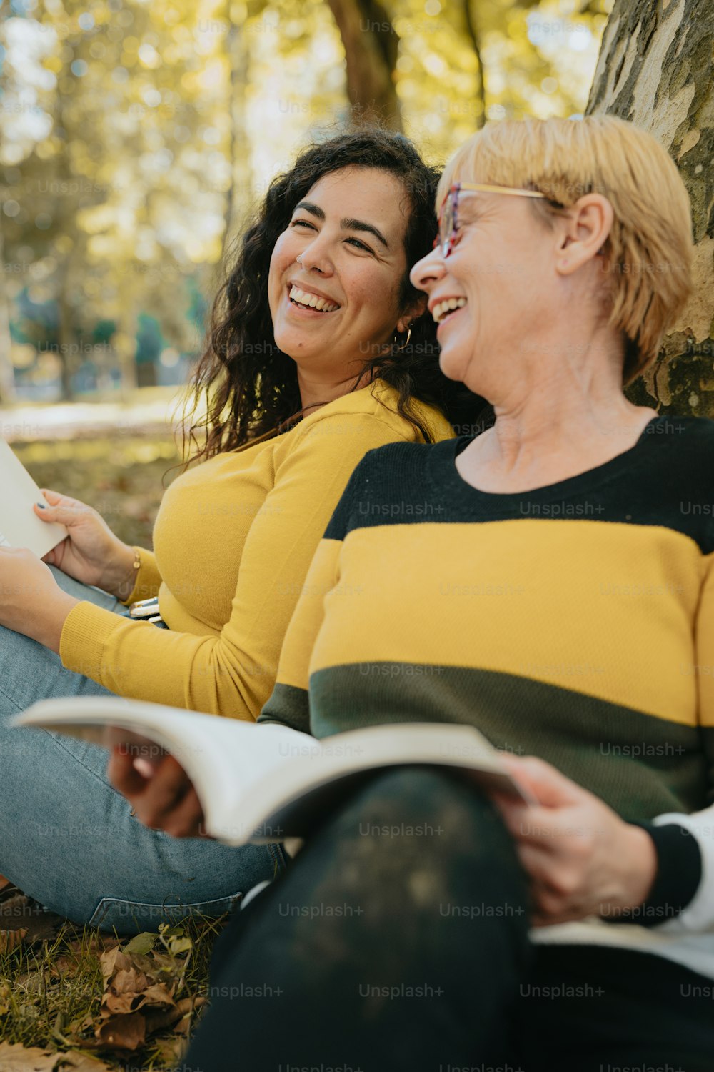 a couple of women sitting next to each other