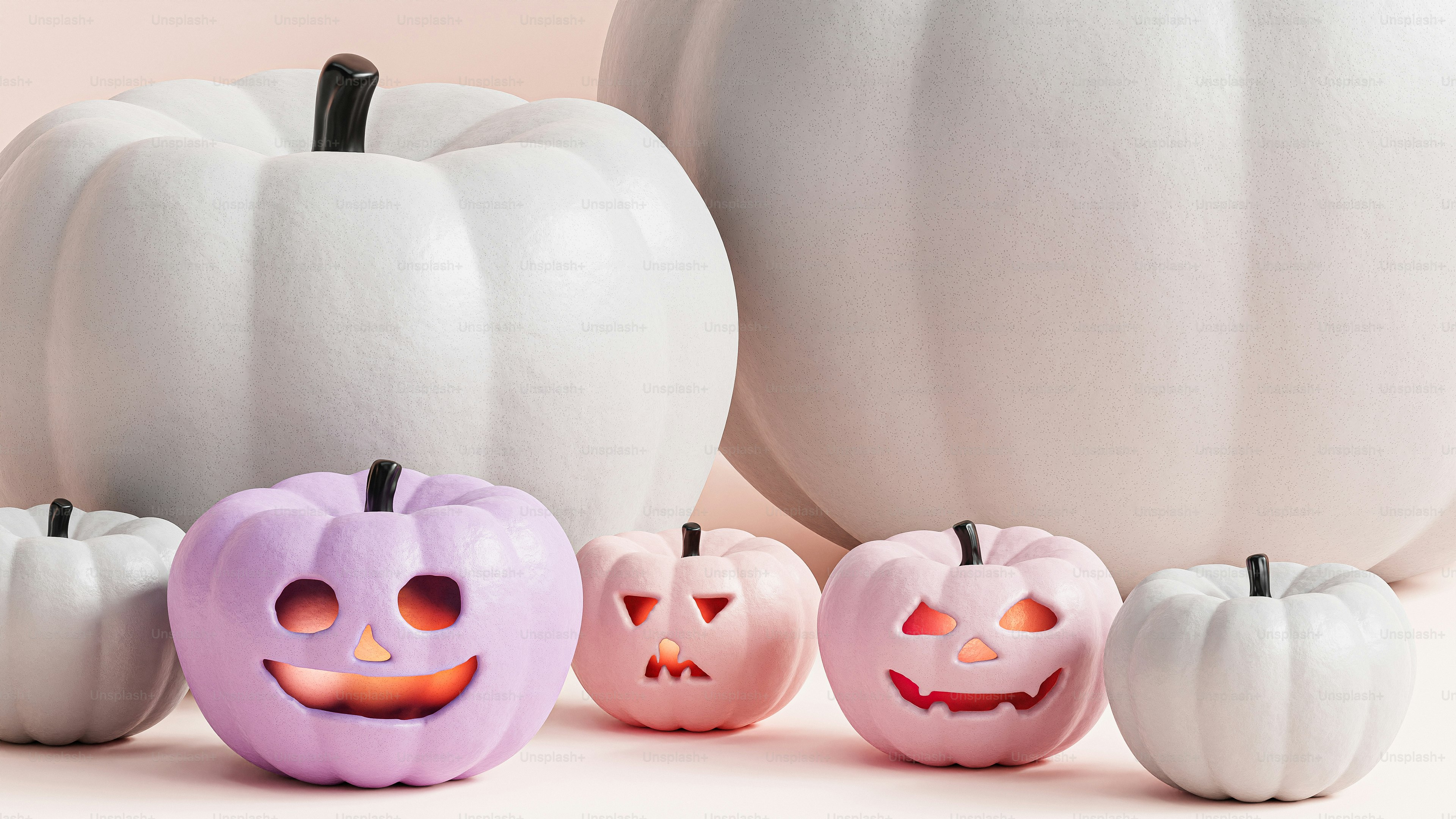 A group of pumpkins with faces carved into them photo – Halloween ...