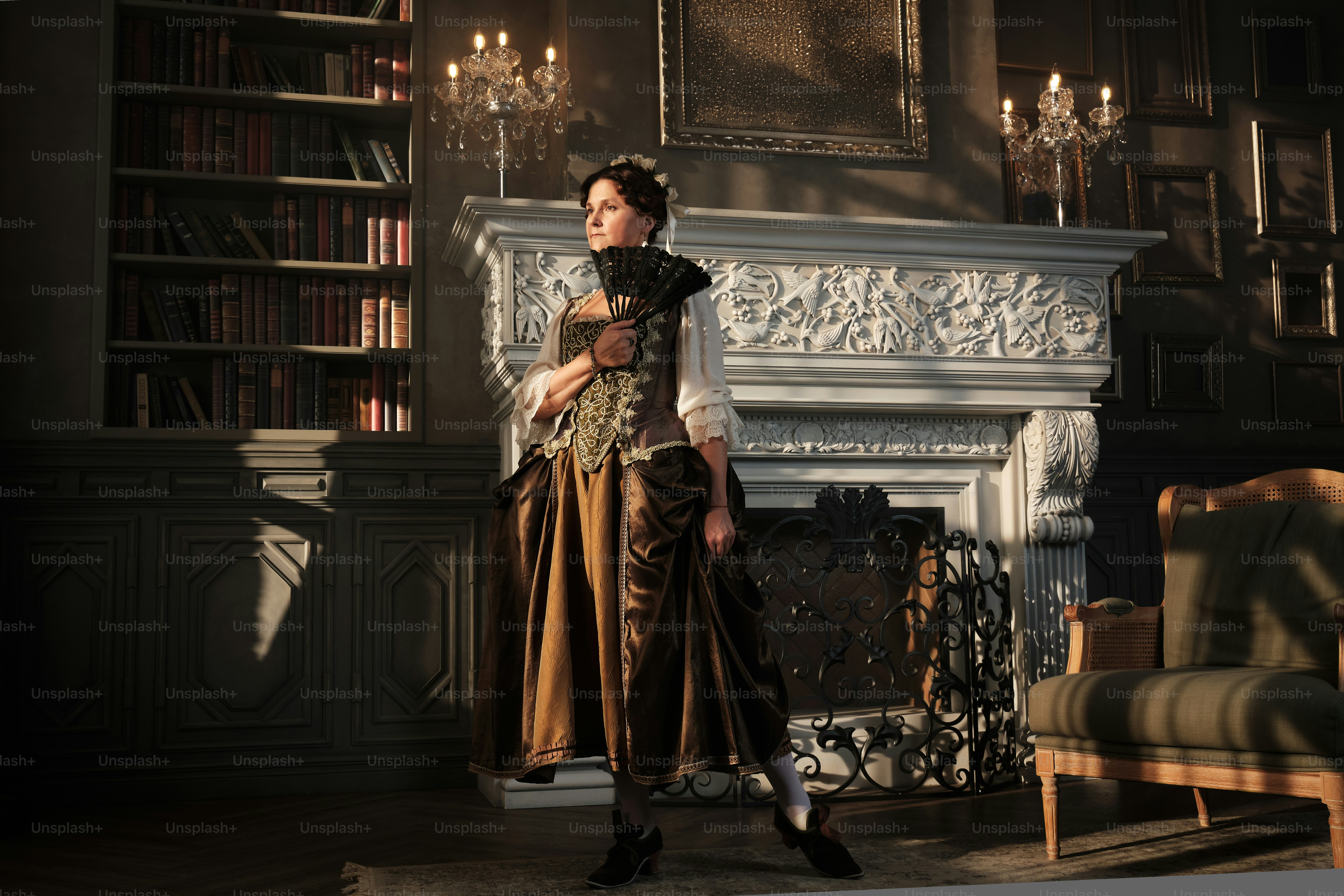 a woman standing in front of a fireplace in a living room