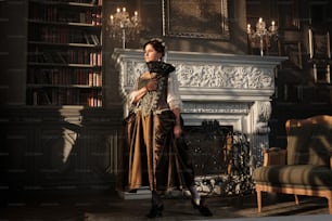 a woman standing in front of a fireplace in a living room