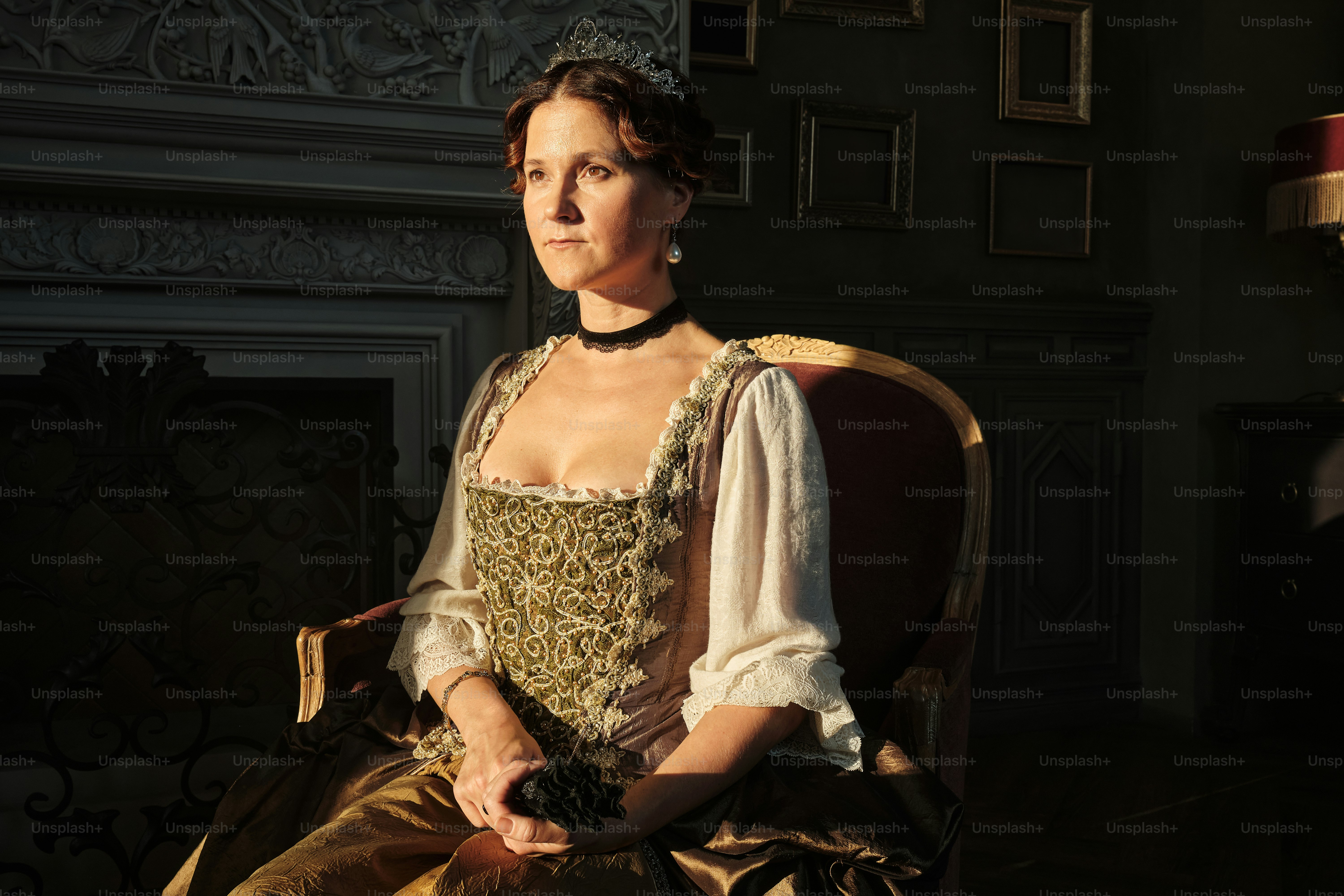 a woman sitting in a chair in a room