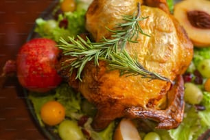 a close up of a plate of food with meat and vegetables