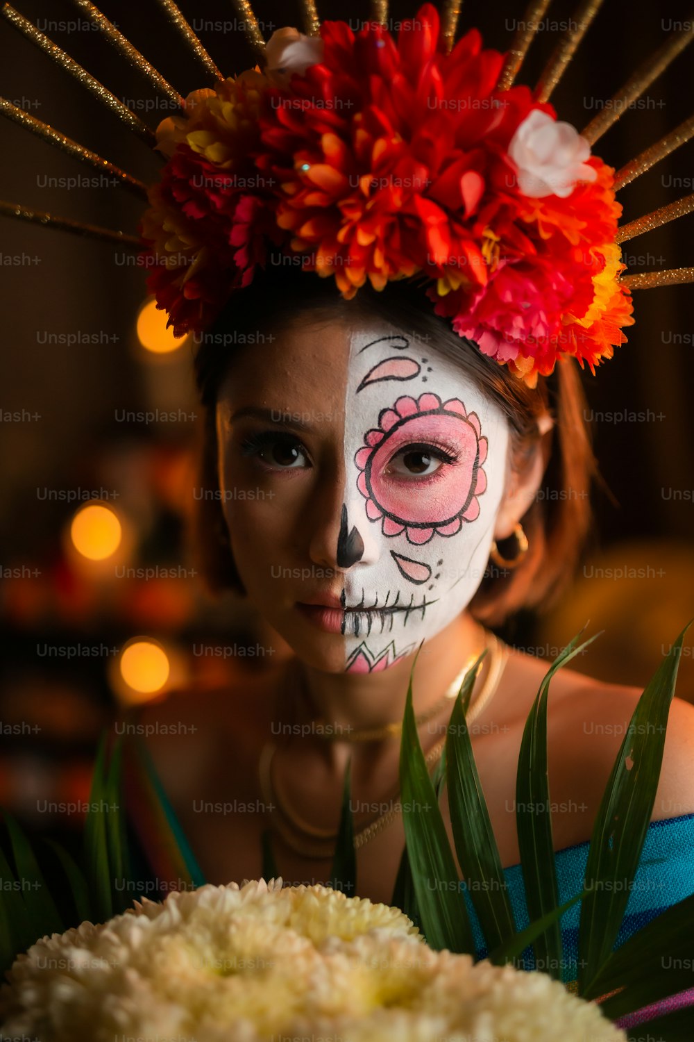 a woman with a skull painted on her face