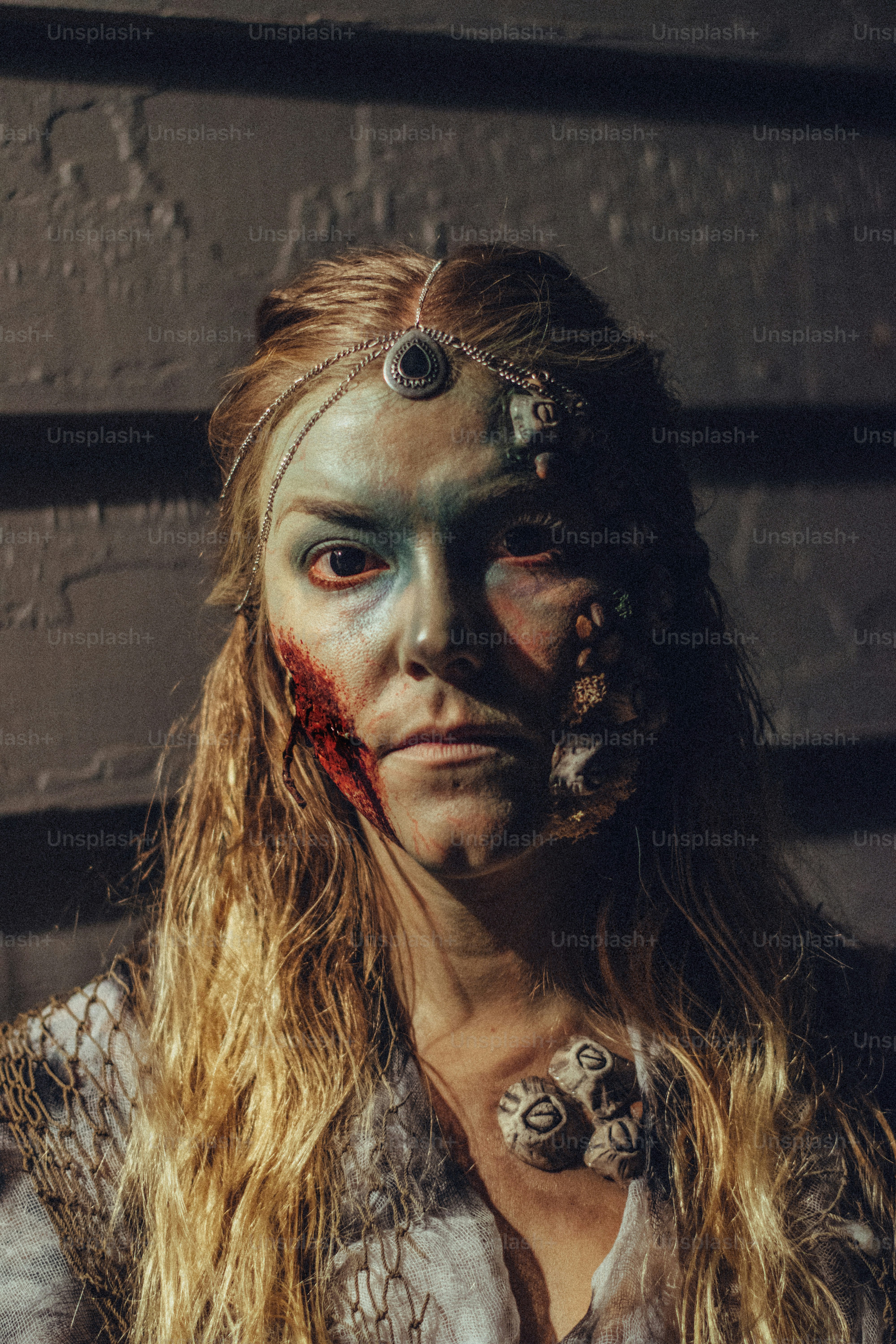 a woman with makeup and makeup art on her face