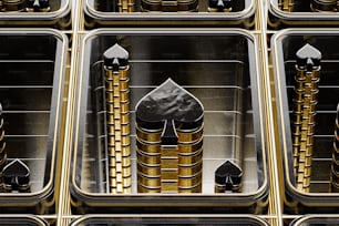 a series of metal trays with gold and black designs