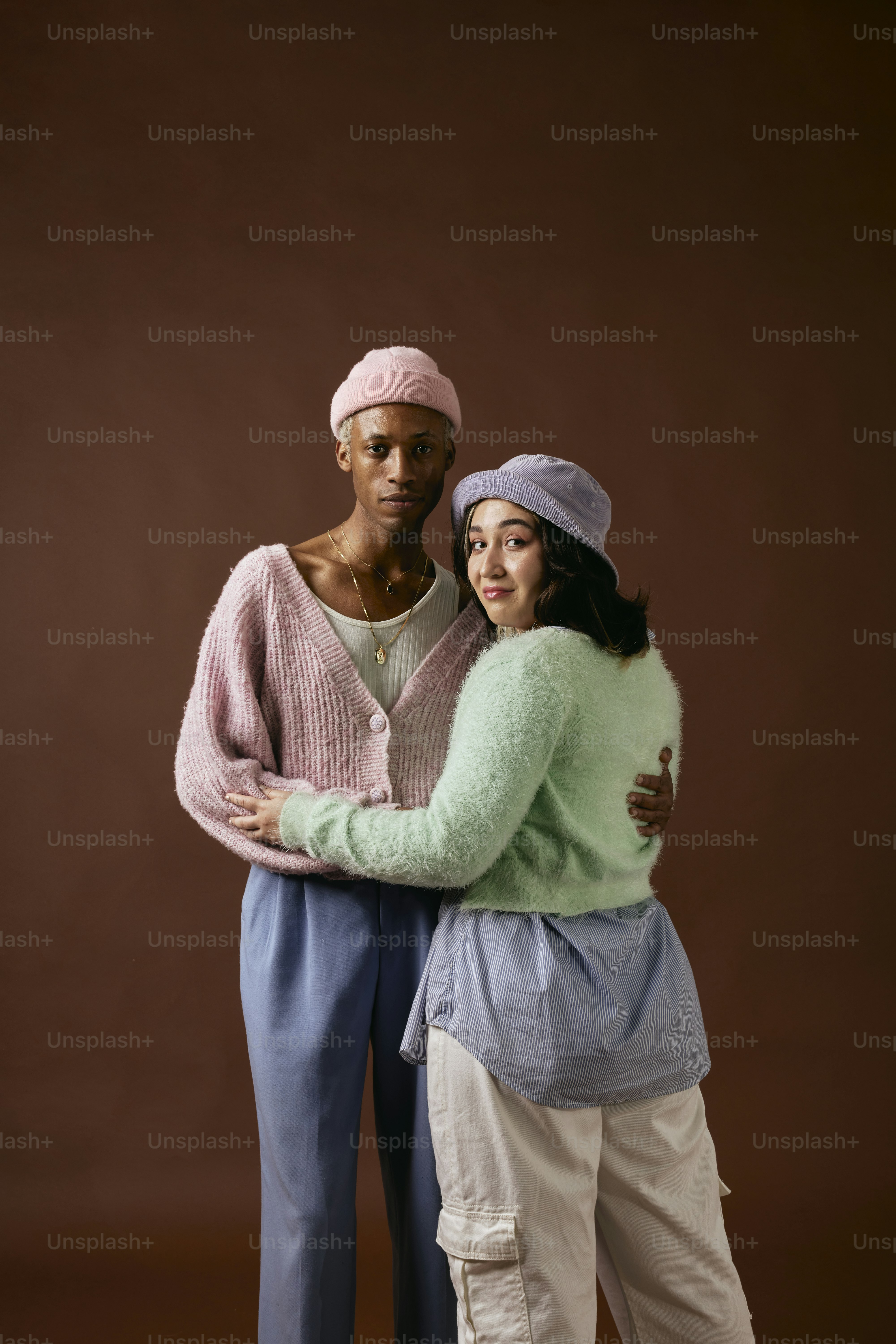 a couple of people standing next to each other