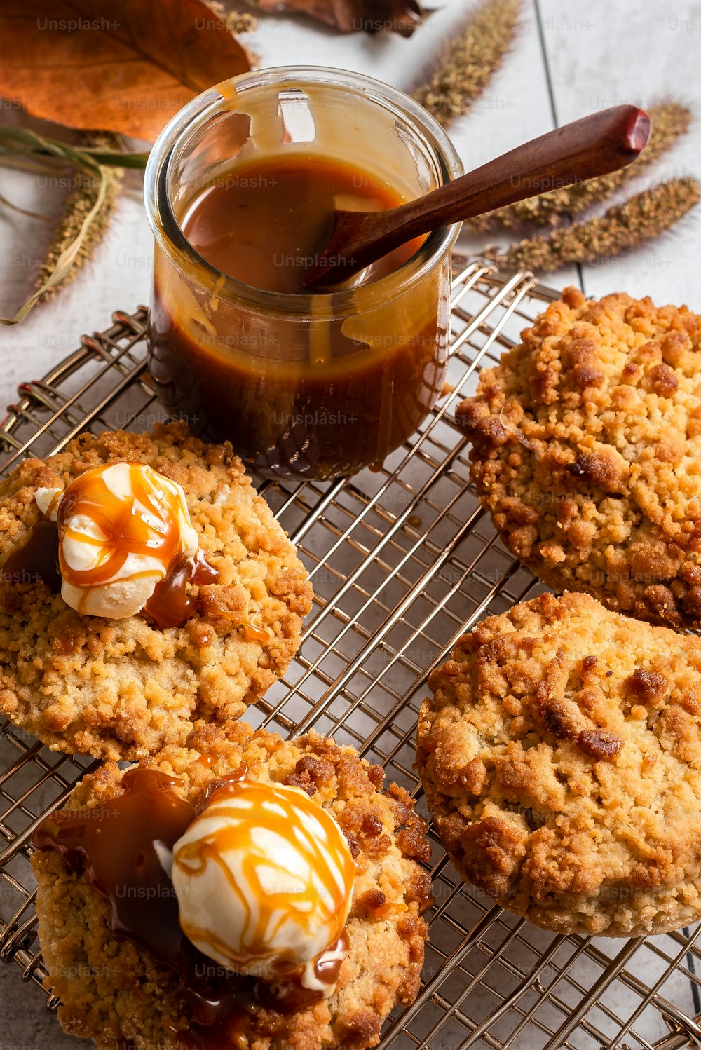 cookies cooling on a wire rack with caramel sauce