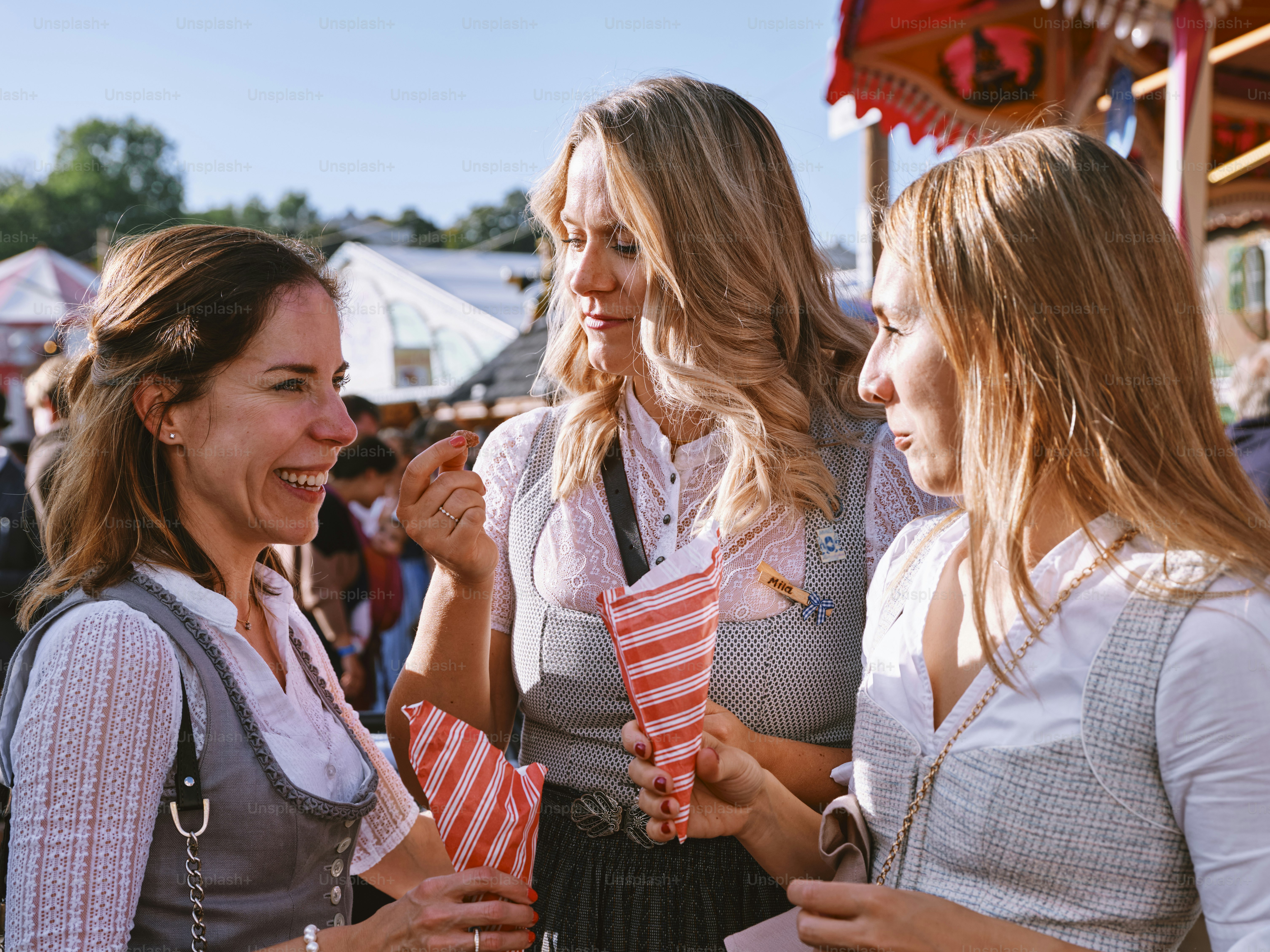 a group of women standing next to each other