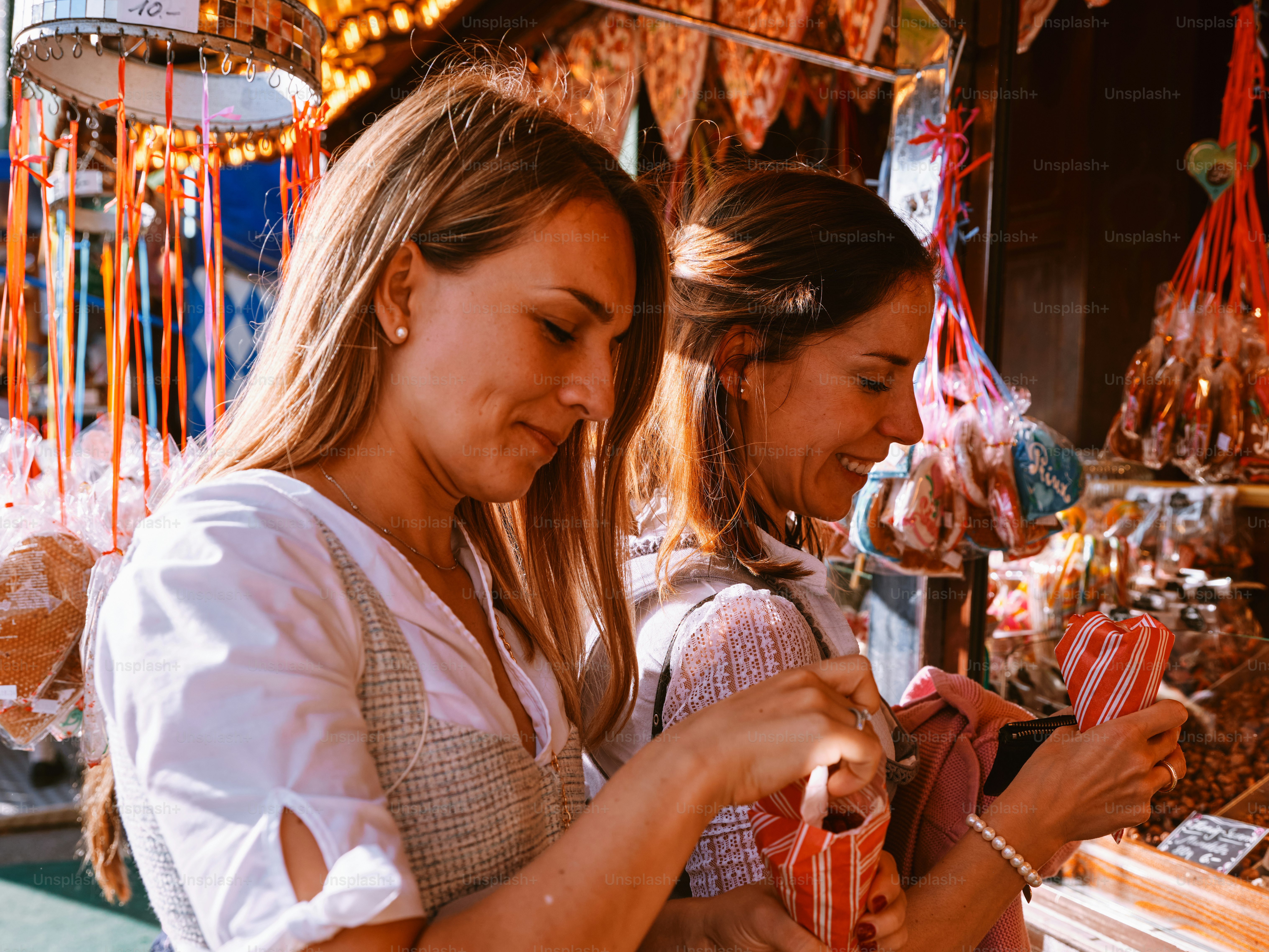 a couple of women standing next to each other
