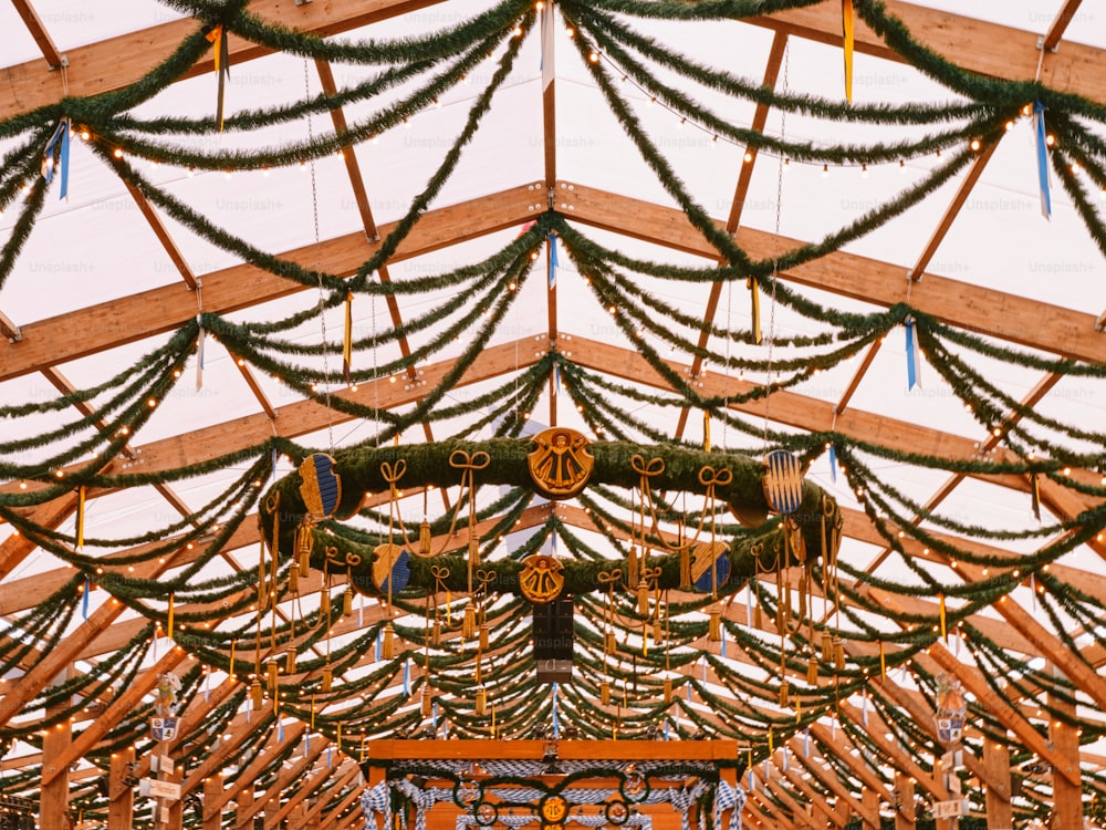 a large wooden structure with a clock on it