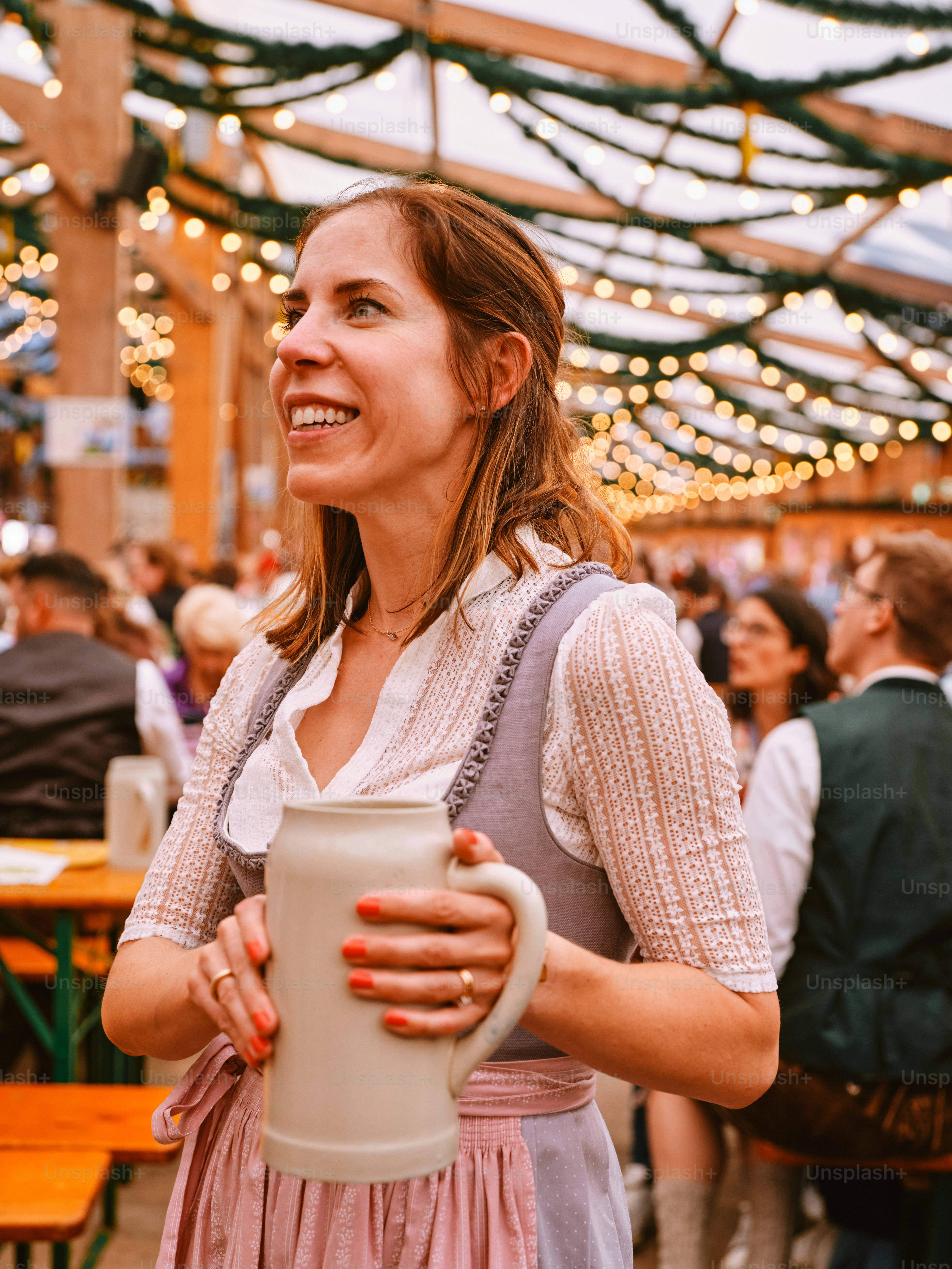 a woman holding a coffee cup in her hands