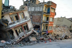 a building that has been torn down by a crane