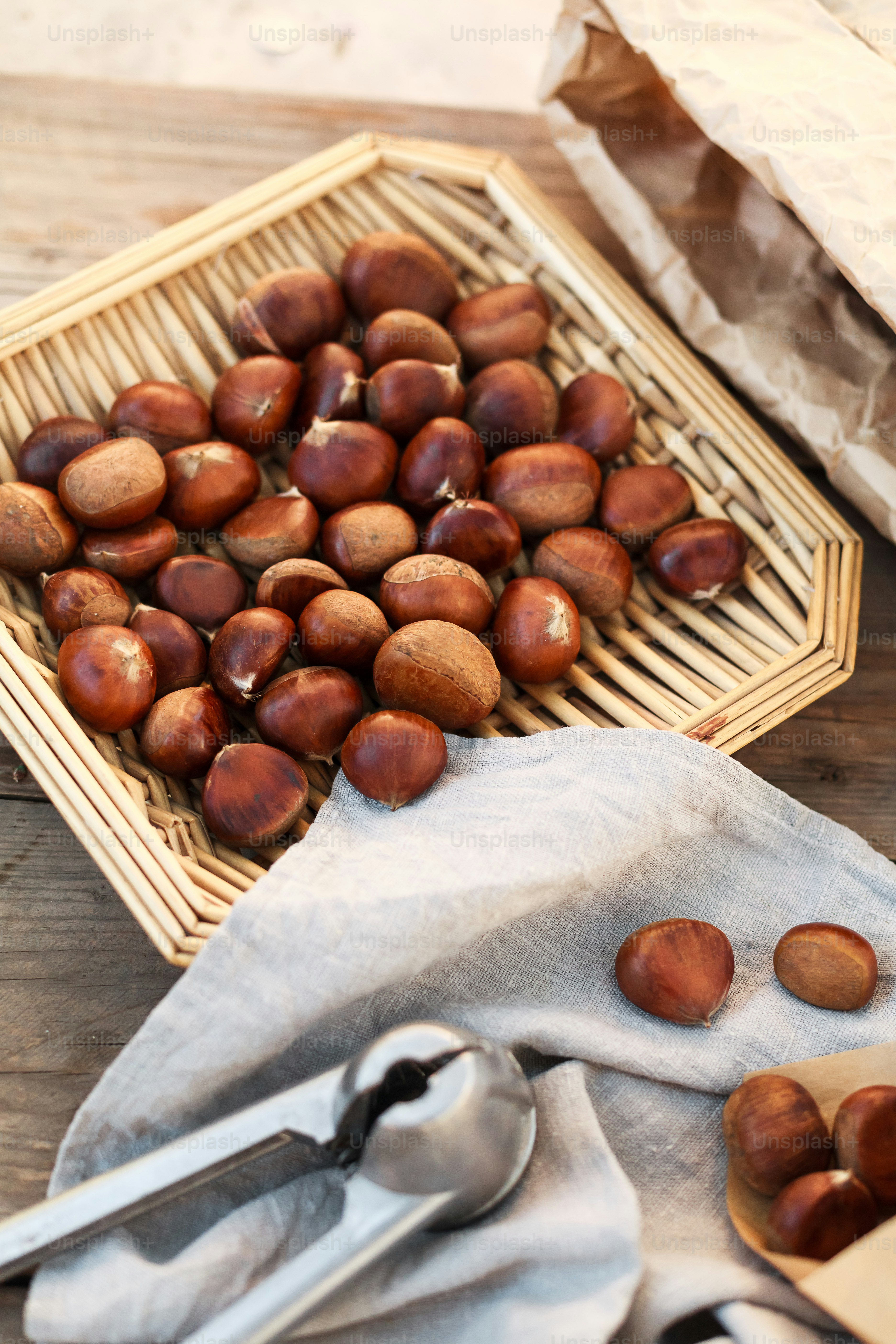a basket full of nuts sitting on a table