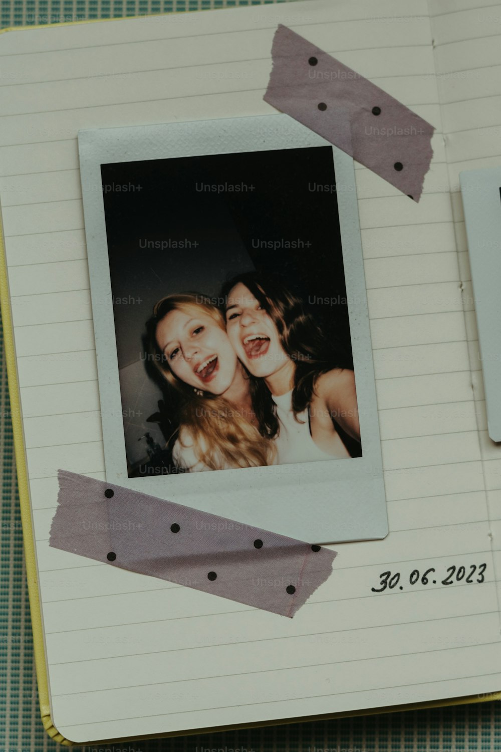 a picture of two girls on a page of a notebook