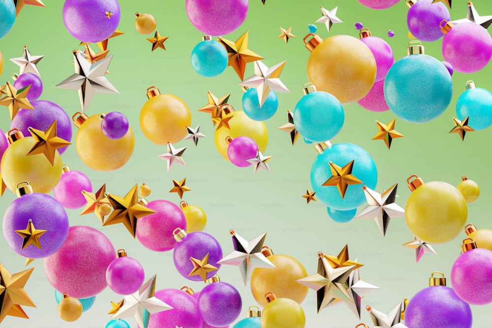 a group of colorful christmas ornaments floating in the air